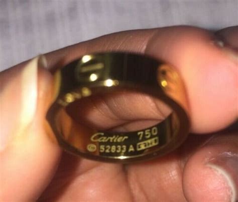 real cartier 750 ring 52833a price|cartier 750 ring 52833a real or fake.